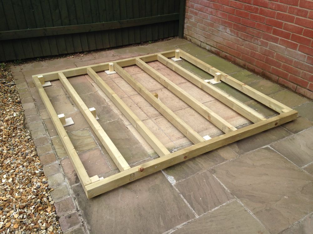Custom timber shed: base frame laid down