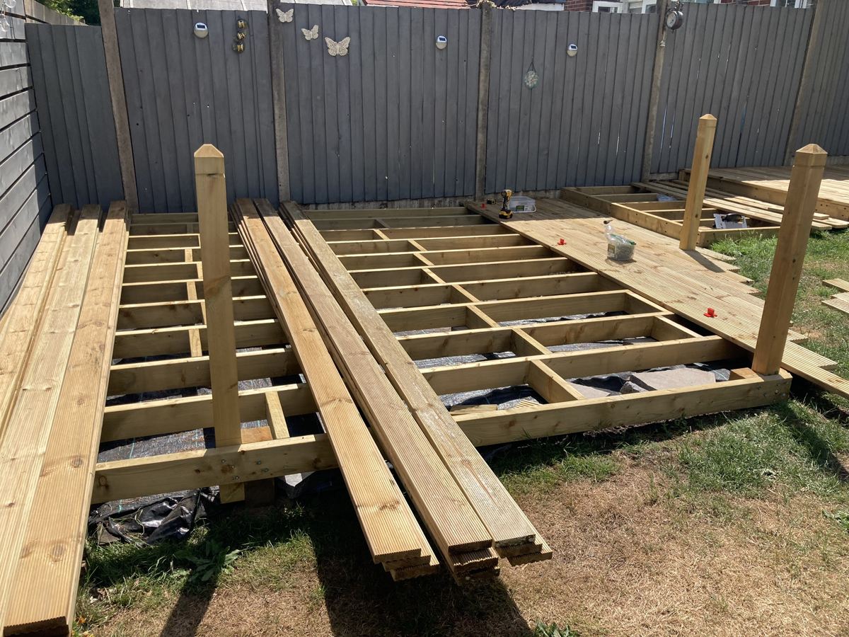 Triple-level deck in Cardiff: lower level, newel posts in